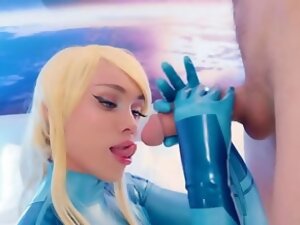 Charming blonde teen in blue latex in free porn video
